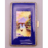 A rolled gold enamel cigarette case. 8.25 cm x 5 cm.