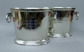 A pair of oval ring handle champagne coolers. 38 cm wide.