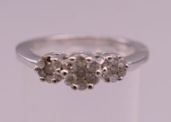 A 9 K white gold diamond ring, approximately diamond 0.33 carat (one diamond lacking).