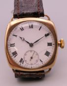 A Zenith 9 ct gold gentlemen's wristwatch, the movement numbered 2353772. 3.2 cm wide.