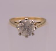 An 18 ct gold diamond solitaire ring (1 carat diamond). Ring size J/K.