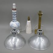 Three lamp bases and two light shades. The largest 47 cm high.