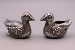 A pair of Chinese silver salt and pepper formed as ducks. 3.5 cm high.