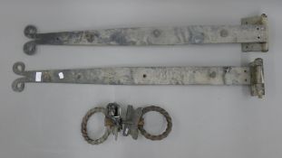 A set of iron hinges and handles. Removed from St Mary's Church, Ely.