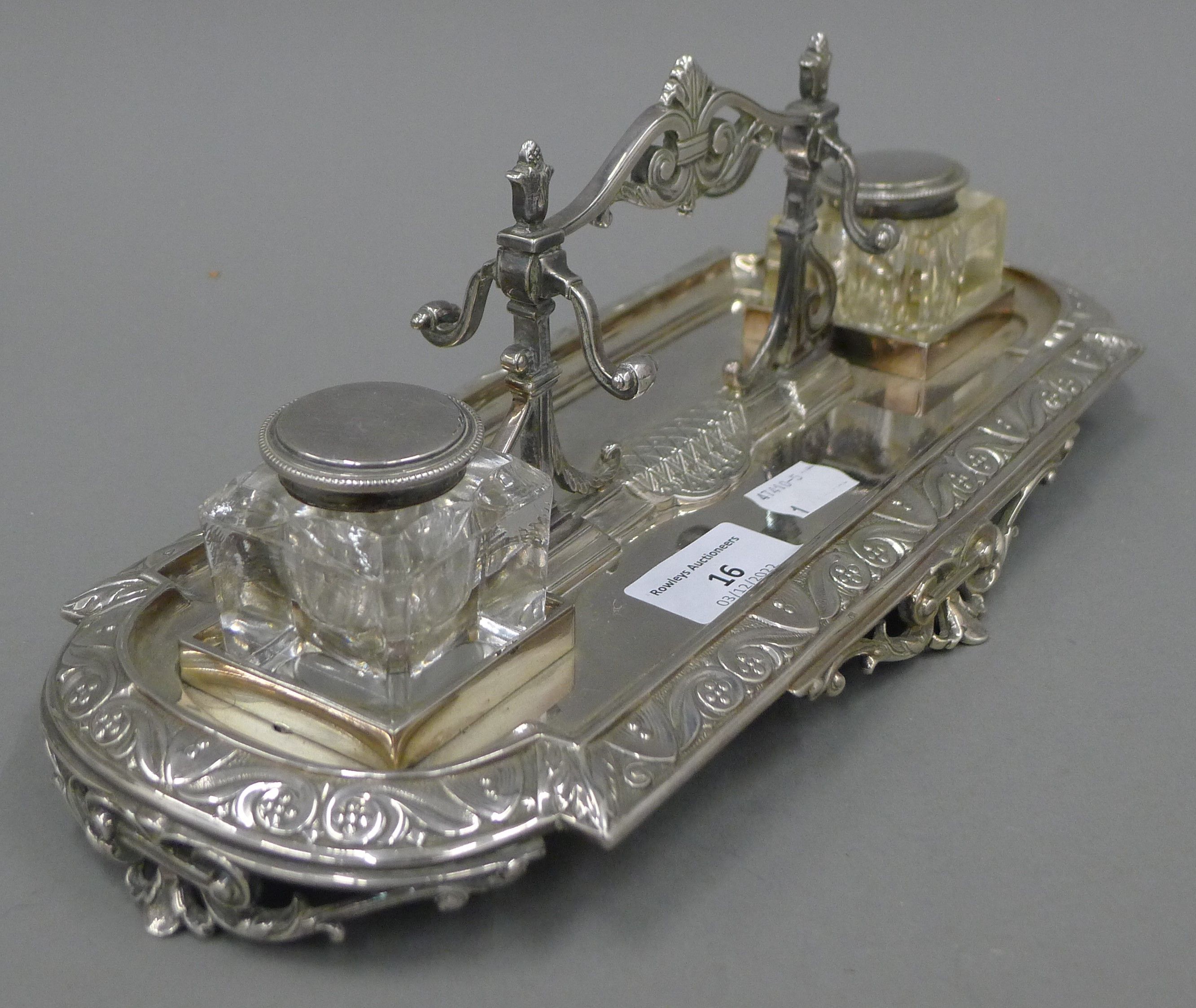 A Victorian silver plated desk stand, with associated inkwells. 32.5 cm long. - Image 3 of 4