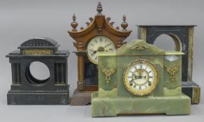 An onyx mantle clock, a Junghans mantle clock and two mantle clock cases.