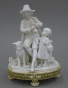 A 19th century Continental bisque figural group. 18 cm high.