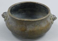 A bronze censer with fo dog handles. 14 cm wide.