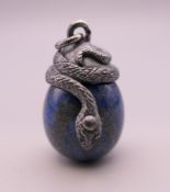 A silver and lapiz egg form pendant. 2.5 cm high.