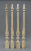 Four turned wooden legs. 81 cm high.