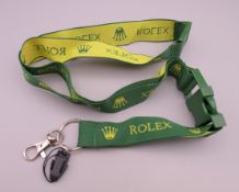 A Rolex lanyard.