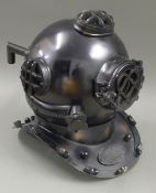 A replica diver's helmet. 42 cm high.