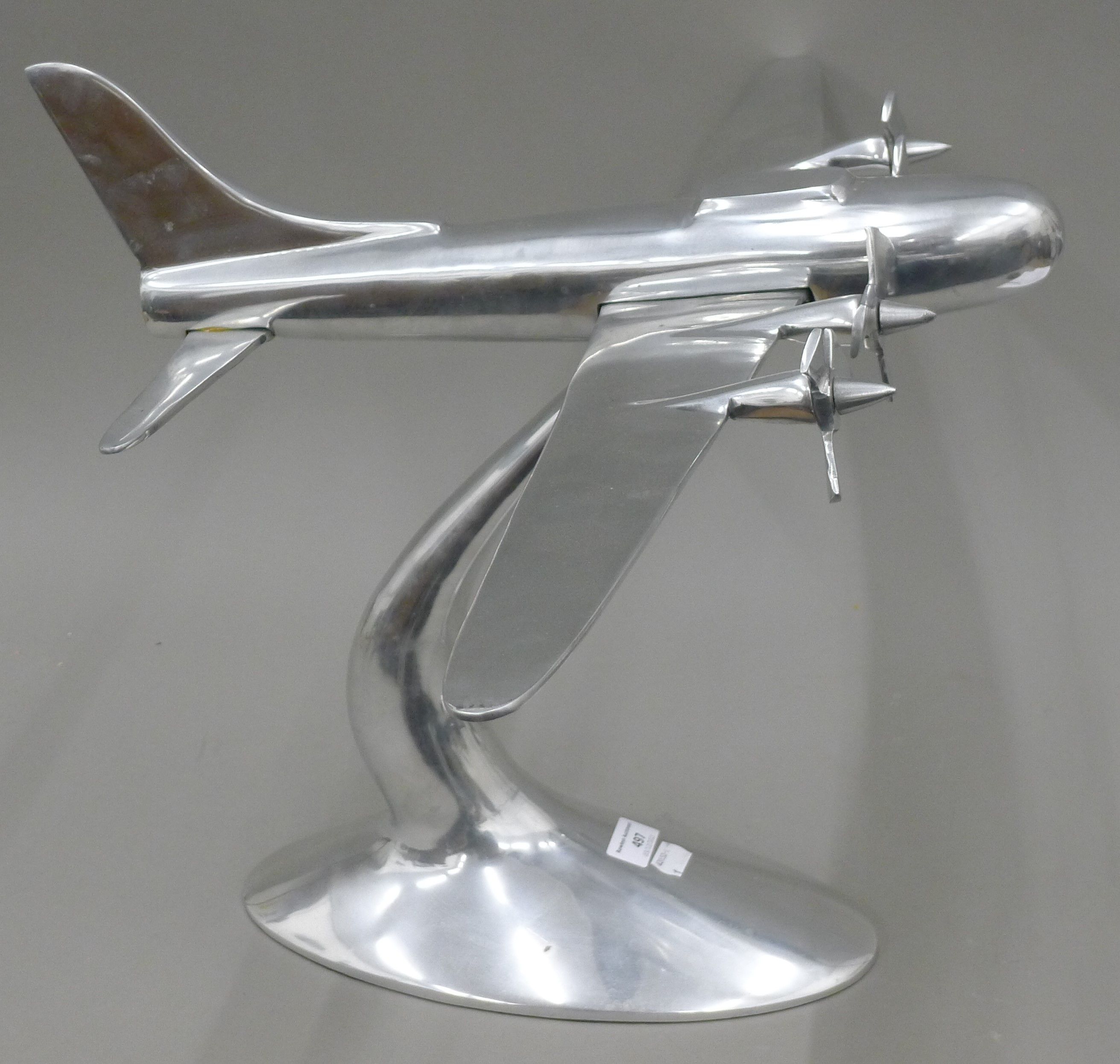 A large aluminium model of a four engine bomber plane. 80 cm wide. - Image 3 of 3