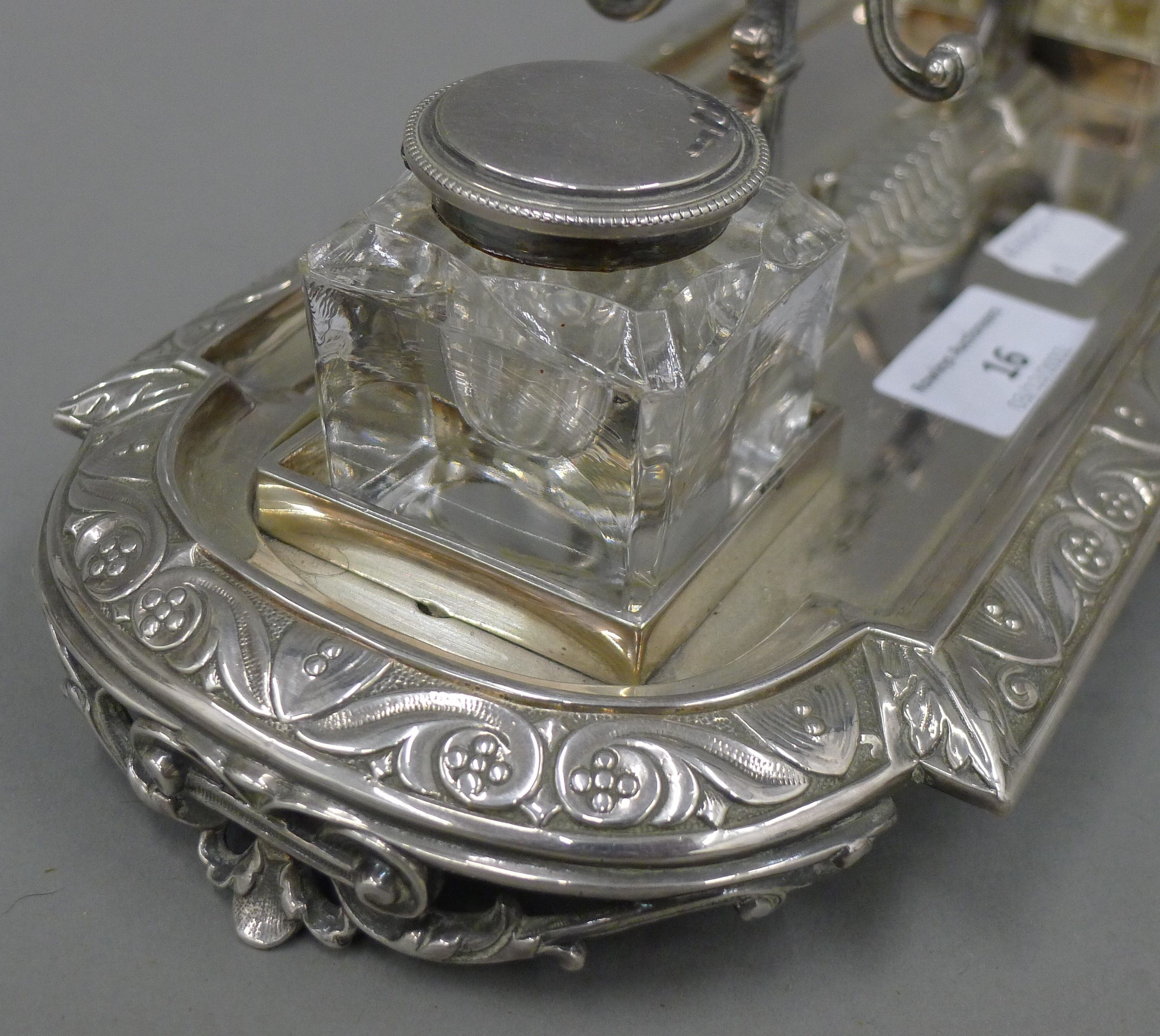 A Victorian silver plated desk stand, with associated inkwells. 32.5 cm long. - Image 4 of 4