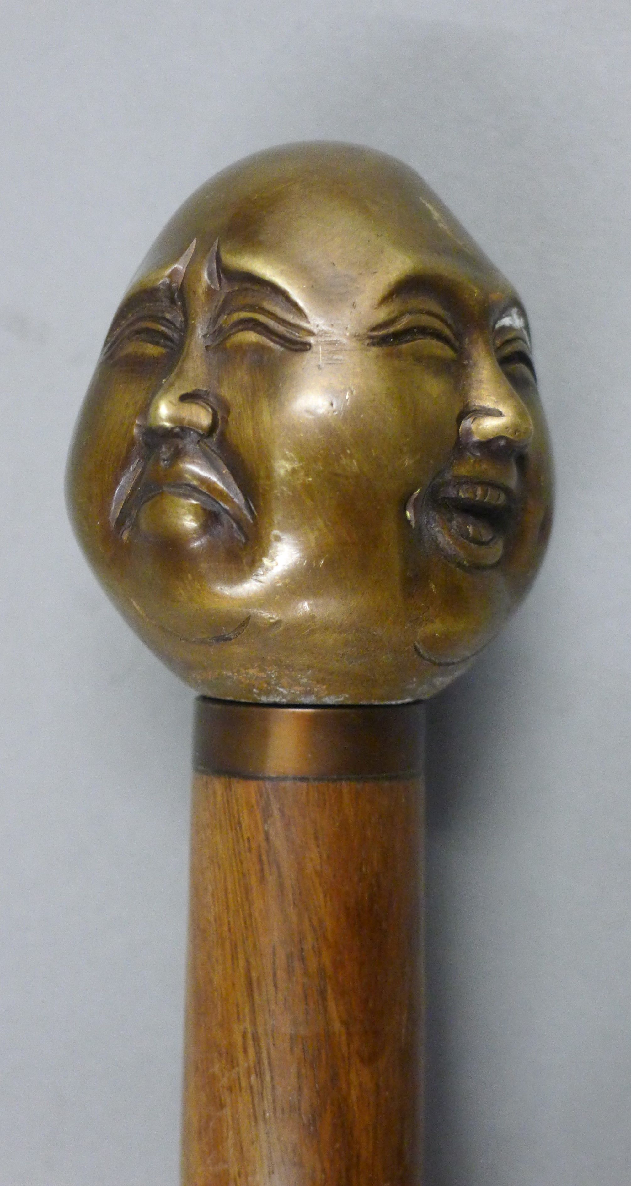 A walking stick with four-faced Buddha handle. 92 cm long. - Image 2 of 3