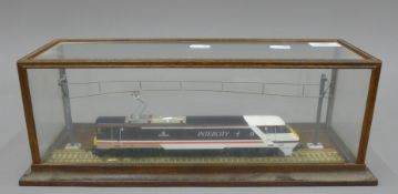 A cased model of an intercity electric train. The case 41 cm long.