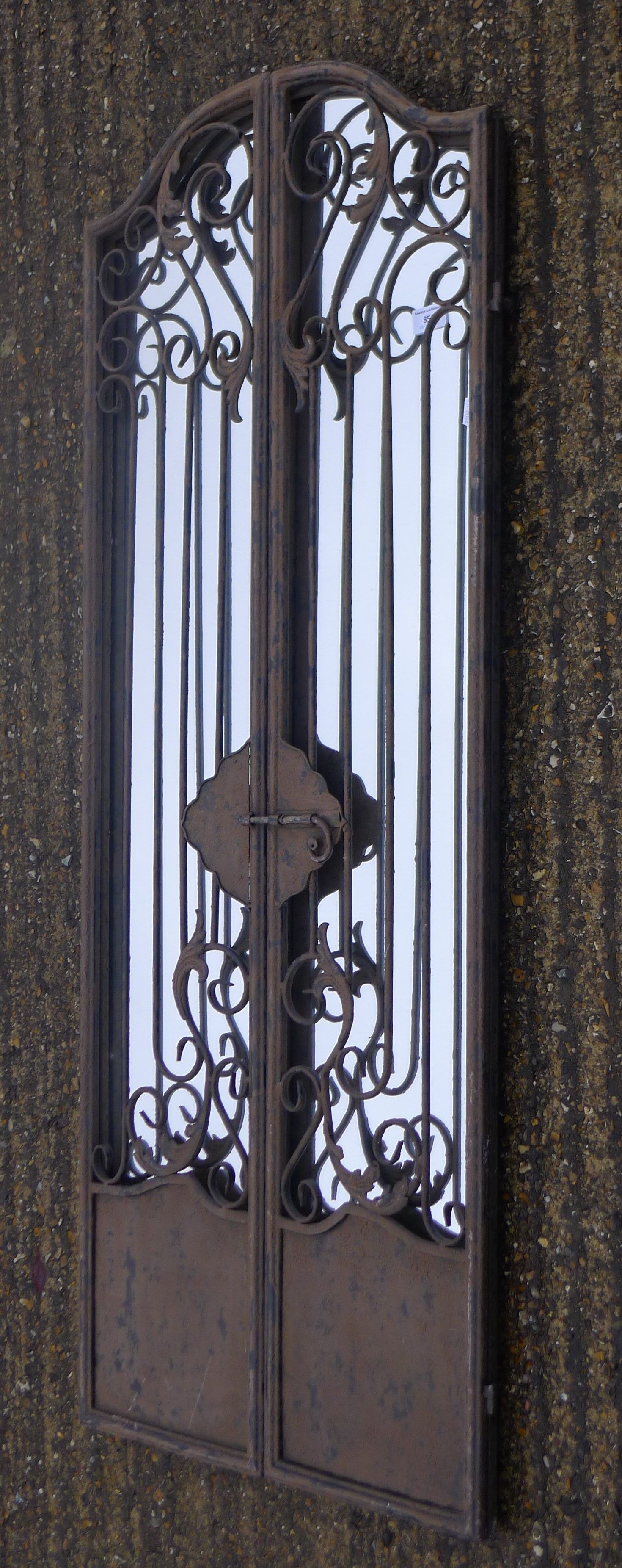 A gate form mirror. 128 cm high.