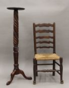 A Victorian mahogany torchere and a ladder back chair. The former 125 cm high.