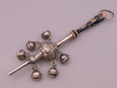 A 925 silver baby's rattle with whistle. 19 cm long.