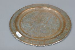 A Persian copper tray. 43 cm diameter.