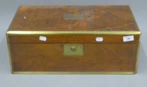 A Victorian brass inlaid walnut writing slope. 50.5 cm wide.