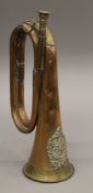 An Argyle and Sutherland Highlands brass and copper bugle.