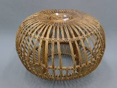 An Italian designed bamboo coffee table. Approximately 60 cm diameter.