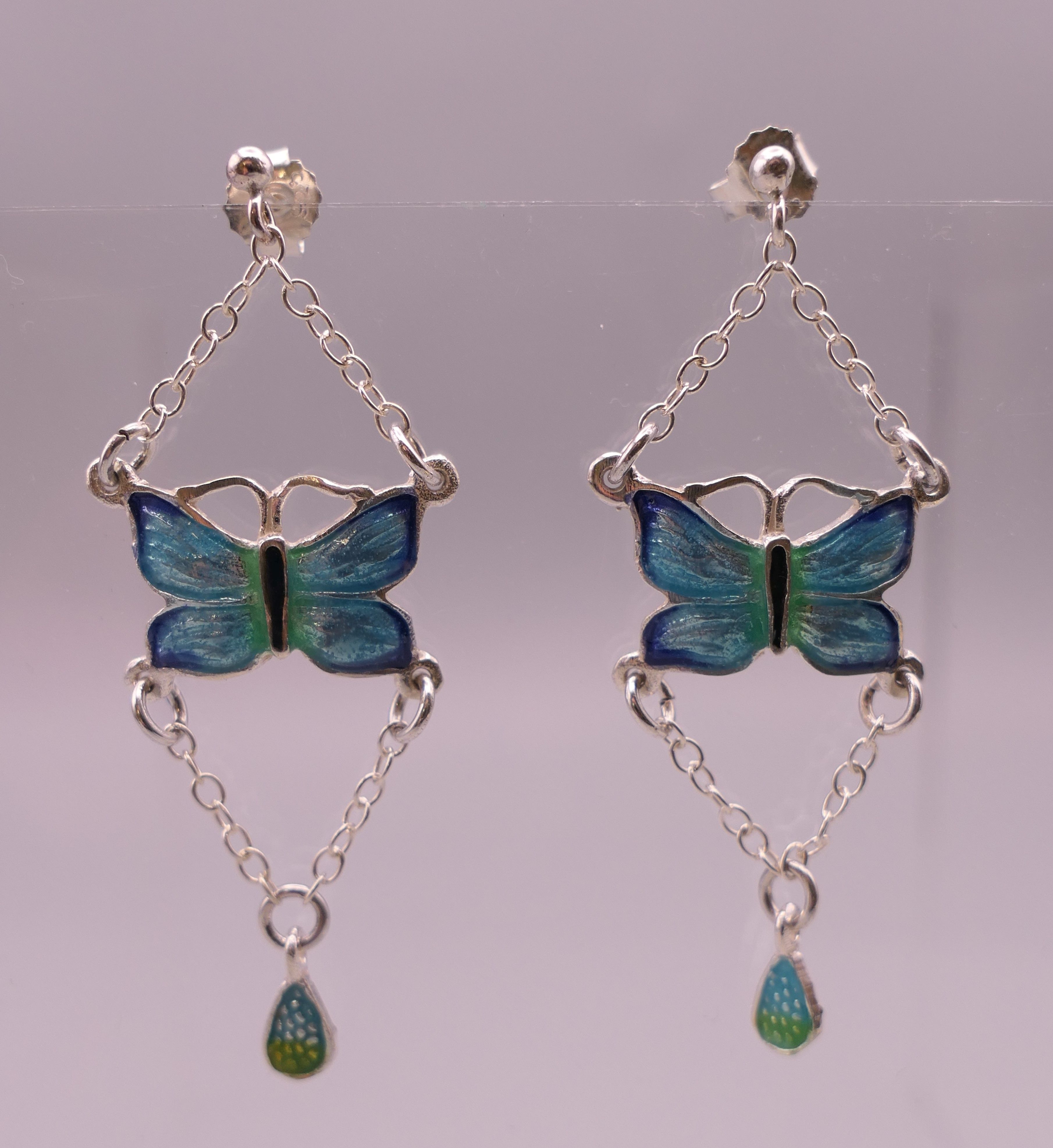 A pair of silver enamel butterfly earrings. 4.5 cm high.
