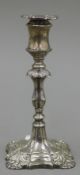 A silver candlestick. 16.5 cm high.