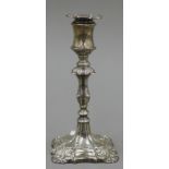 A silver candlestick. 16.5 cm high.