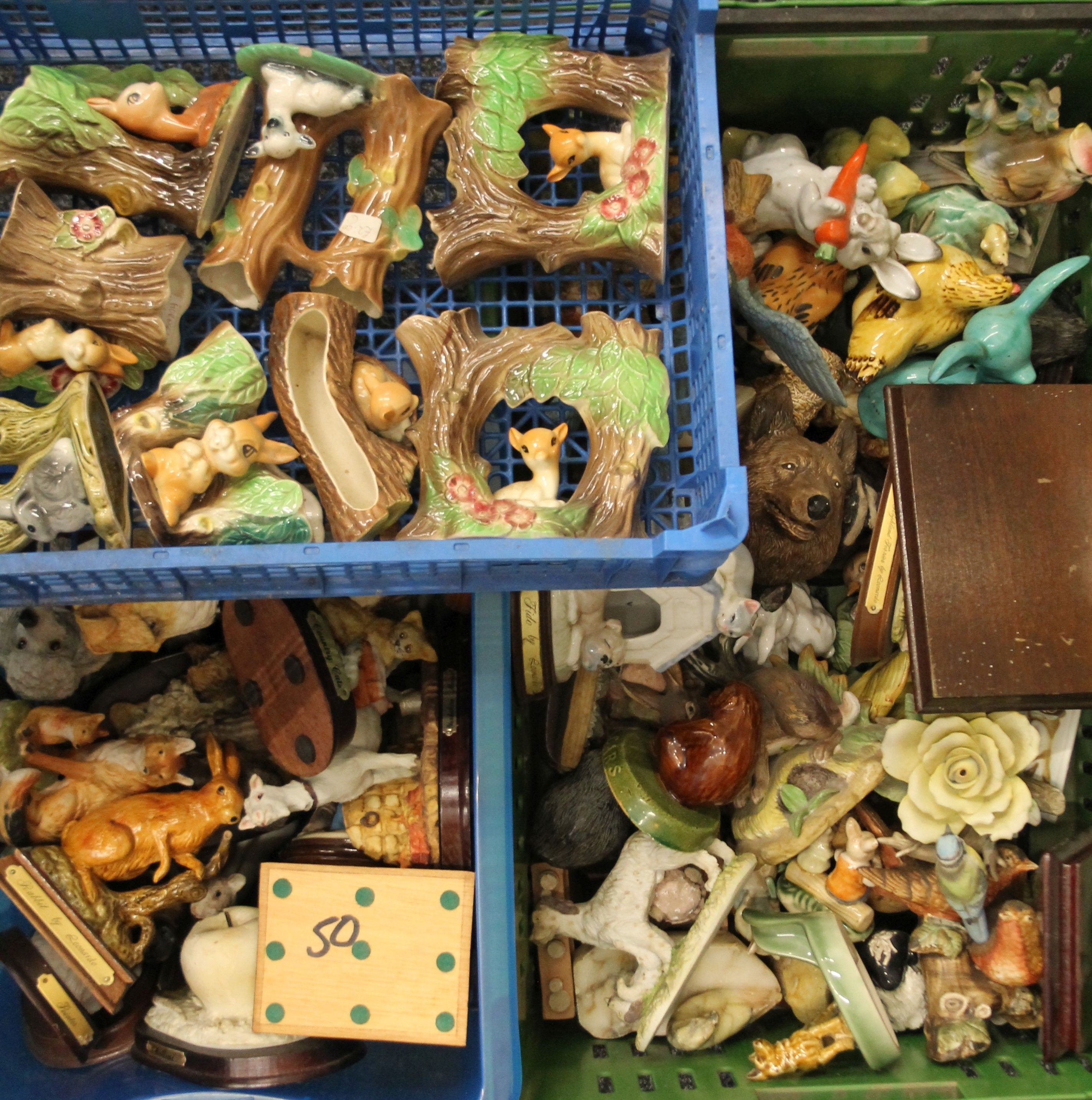 A large quantity of animal figurines.