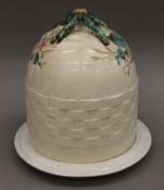 A Victorian cheese dome on an associated stand. 30 cm high.