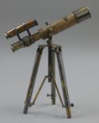 A telescope and stand. 25 cm long.