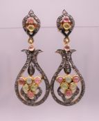 A pair of unmarked gold, diamond and tourmaline set drop earrings. 5 cm high. 11.