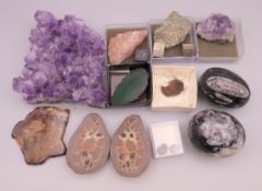 A quantity of mineral specimens, including a possible meteorite fragment.