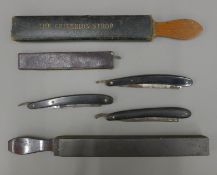 A collection of cut throat razors, etc.