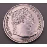 An 1817 silver half crown coin.