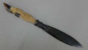 A Victorian horn paper knife with deer slot handle. 32 cm long.