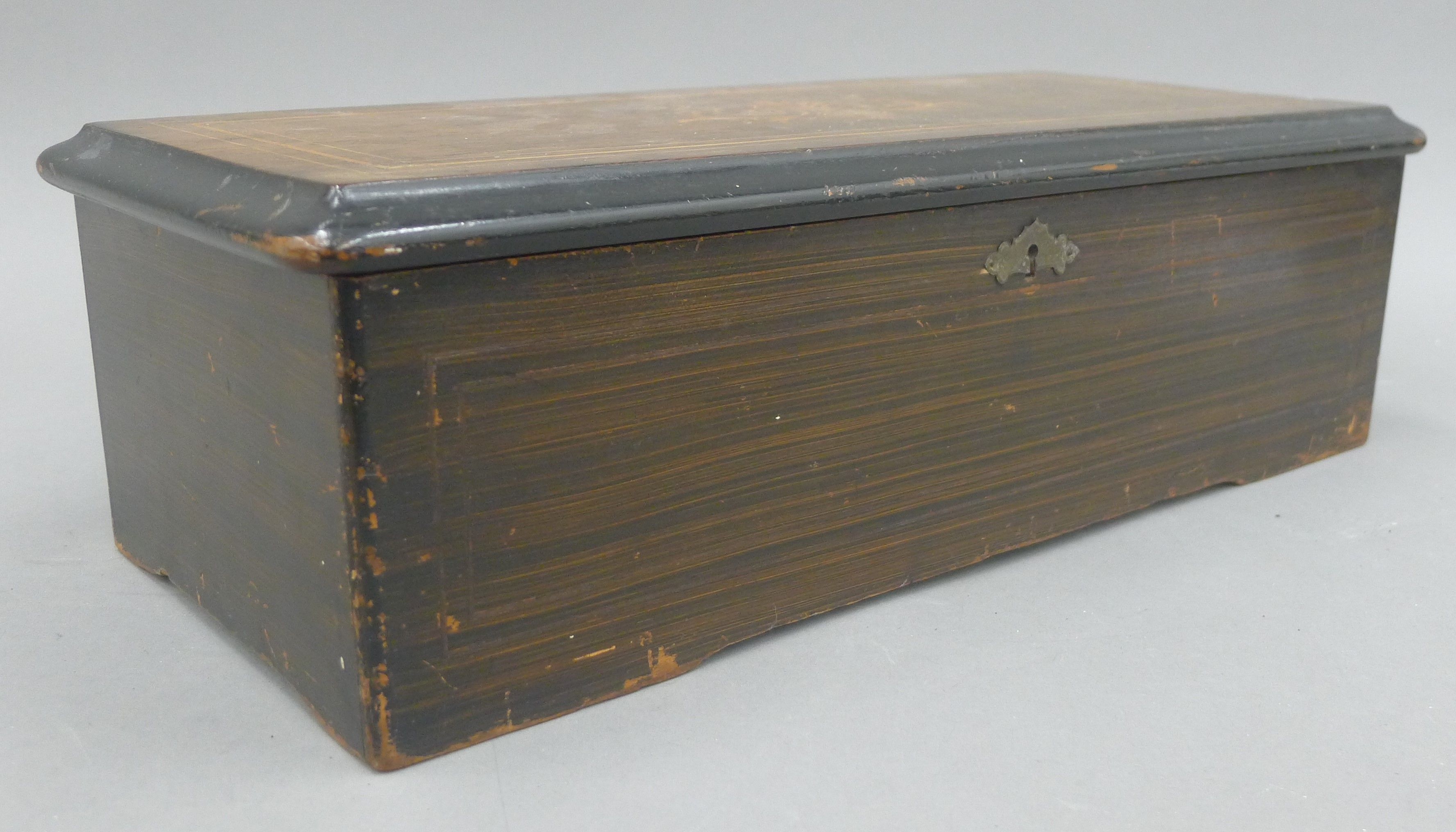 A 19th century inlaid music box. 43 cm wide. - Image 7 of 7