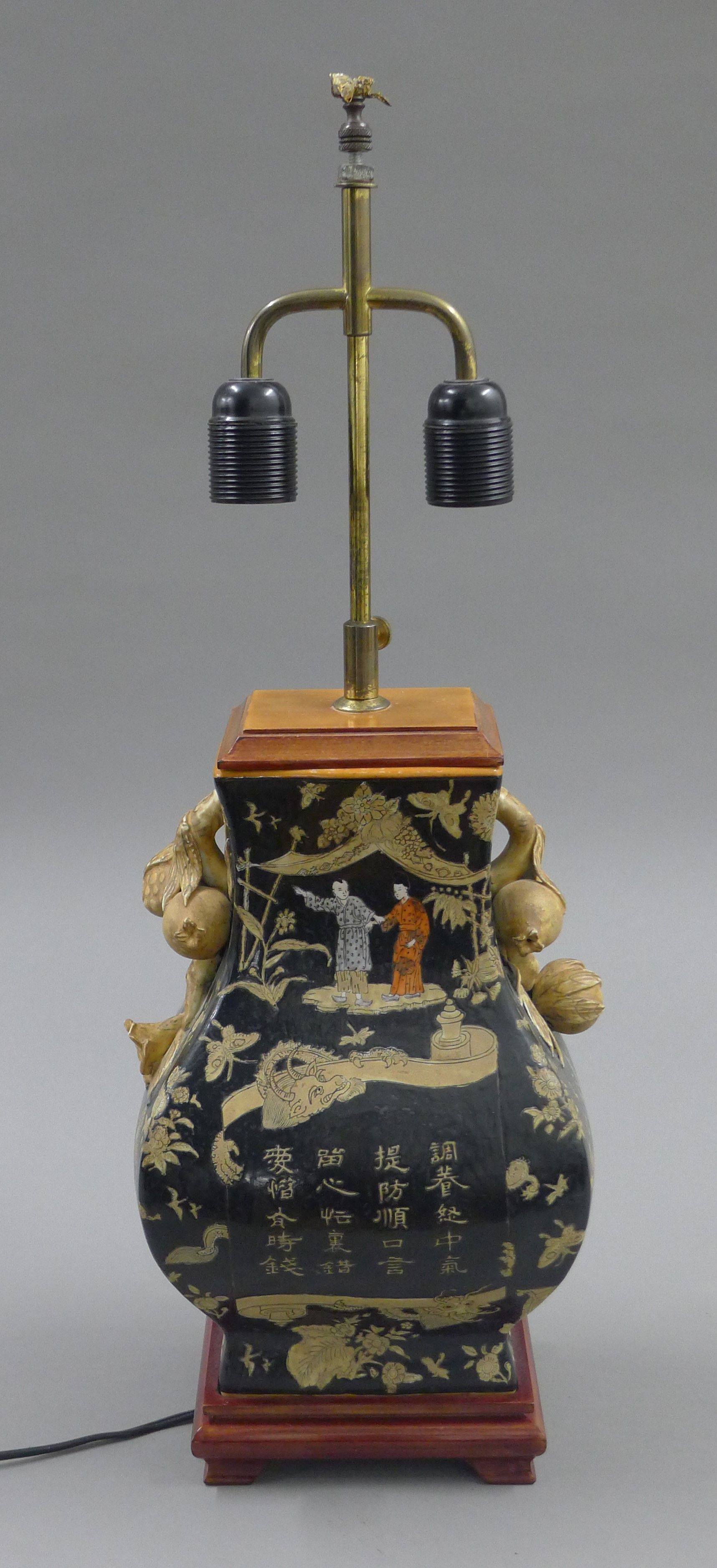 A Chinese famille noir porcelain vase mounted as a lamp. 65 cm high overall.