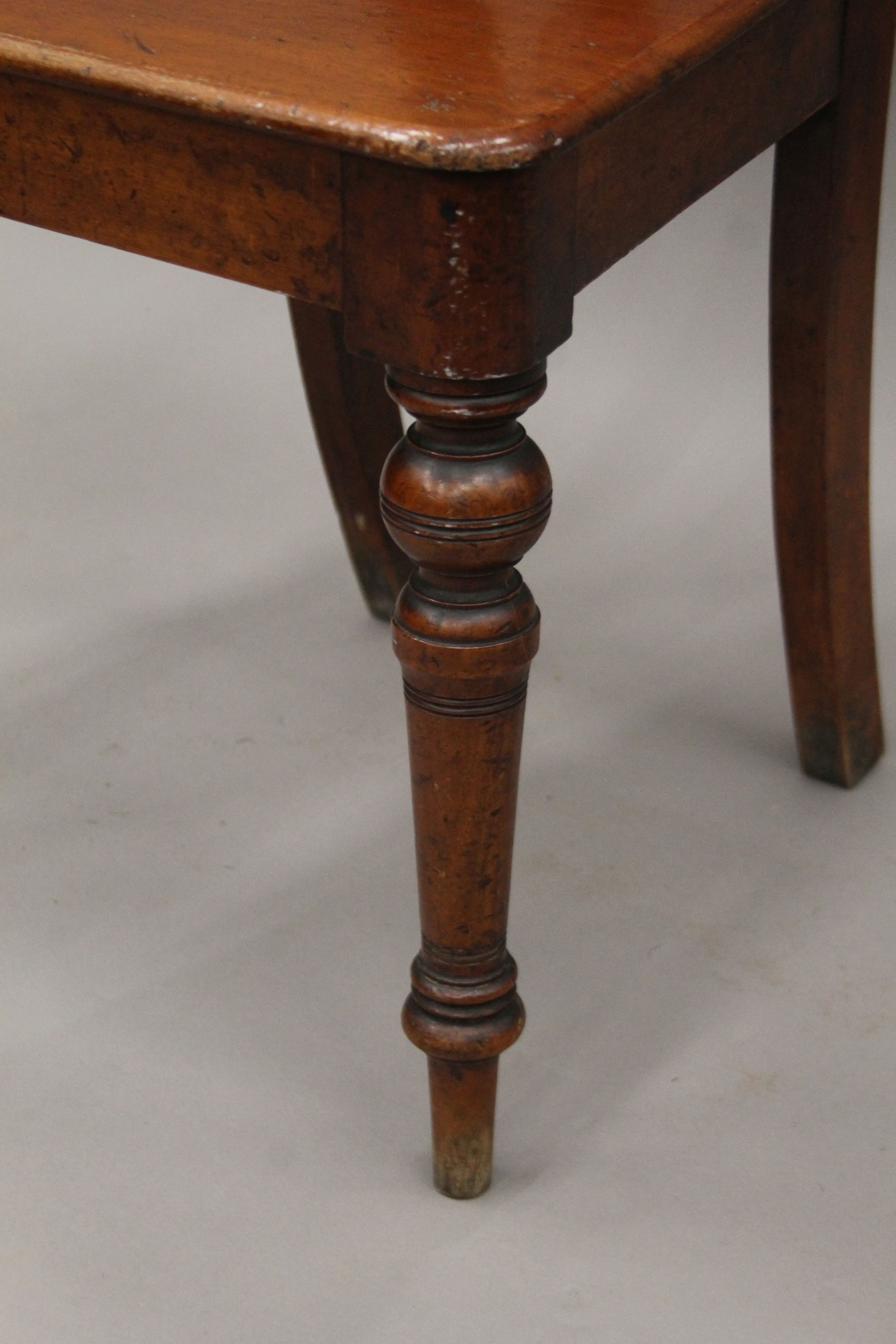 A Victorian mahogany hall chair. 46 cm wide. - Image 5 of 5