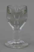 An 18th/19th century French penny lick glass. 9.75 cm high.