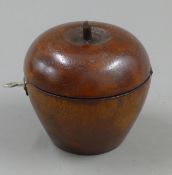 An apple formed tea caddy. 11 cm high.