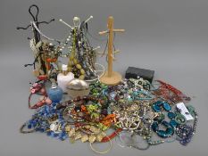 A large quantity of costume jewellery, etc.