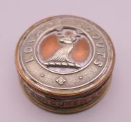 A Lovat's Scouts trench art type paperweight.