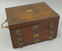 A 19th century leather jewellery box. 31 cm wide.