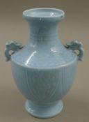 A Chinese light blue ground porcelain vase. 31 cm high.