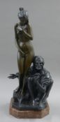 A bronze model of an Arab and a nude mounted on a marble plinth base. 69 cm high.