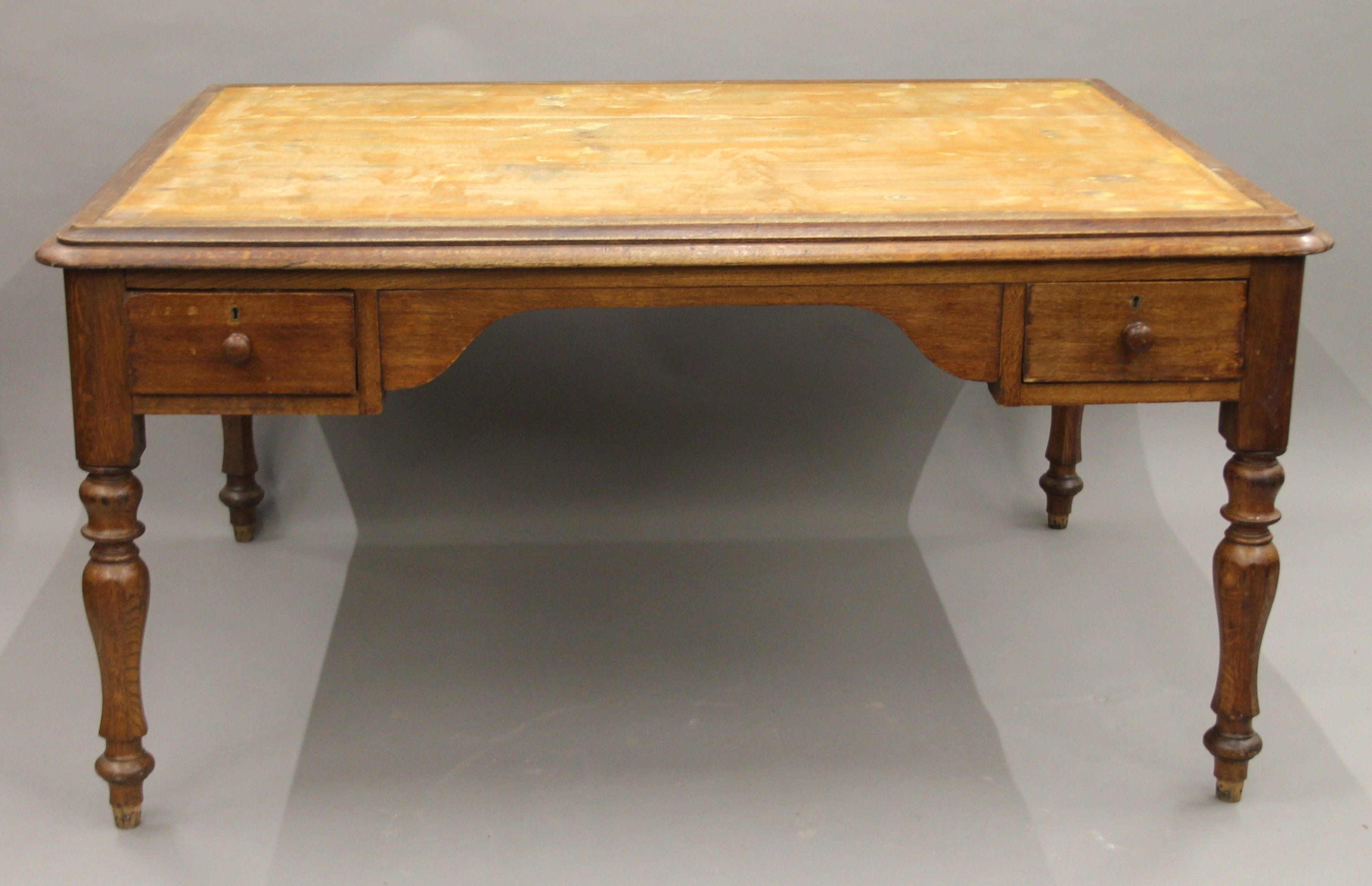 A Victorian oak partner's writing table. 153 cm wide. - Image 2 of 5