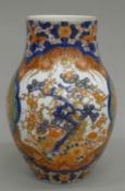 A 19th century Japanese Imari porcelain vase. 24.5 cm high.